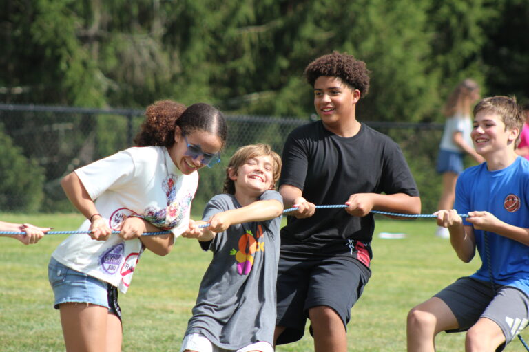 Middle school students playing tug of war